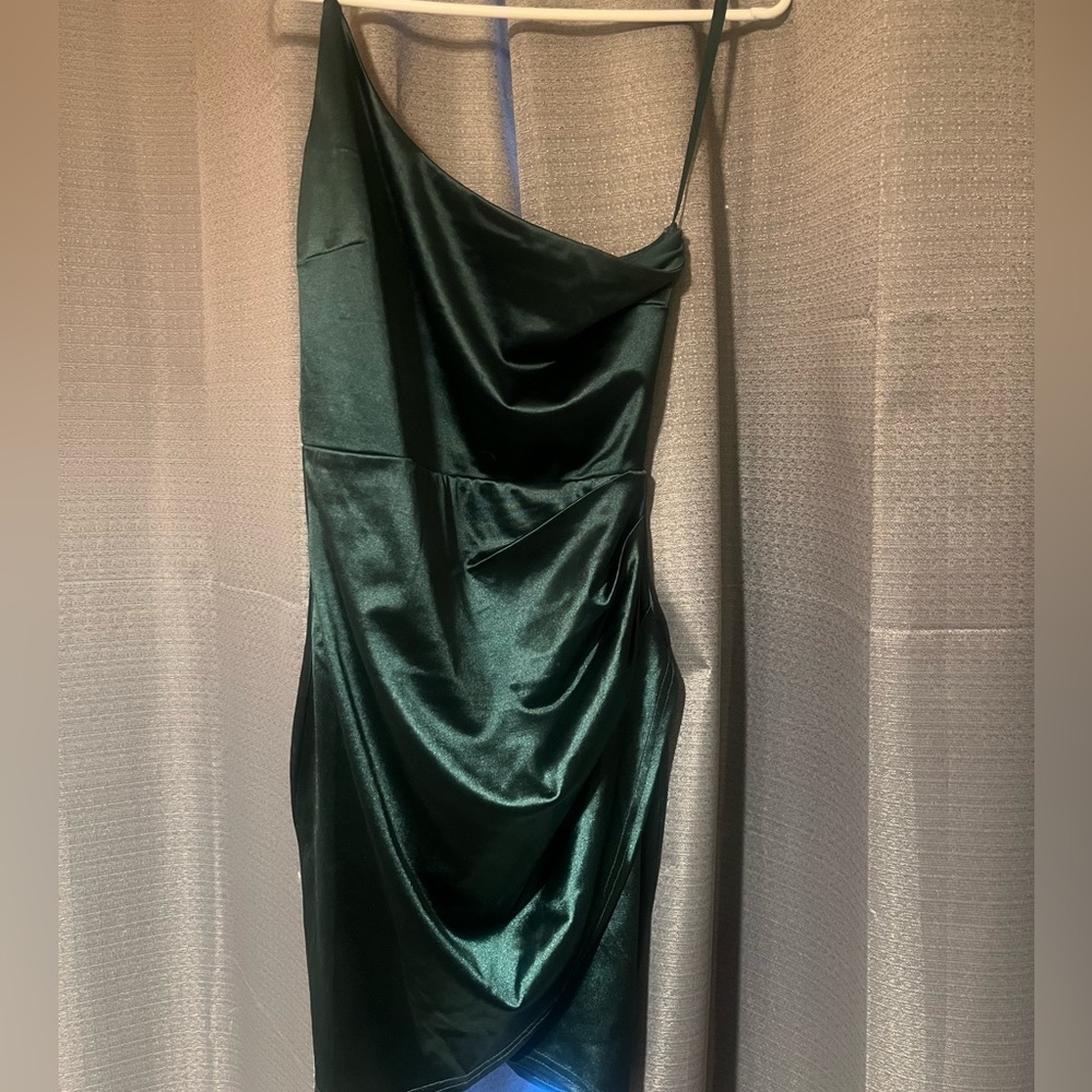 one shoulder green mini dress perfect for a homecoming dance or any occasion